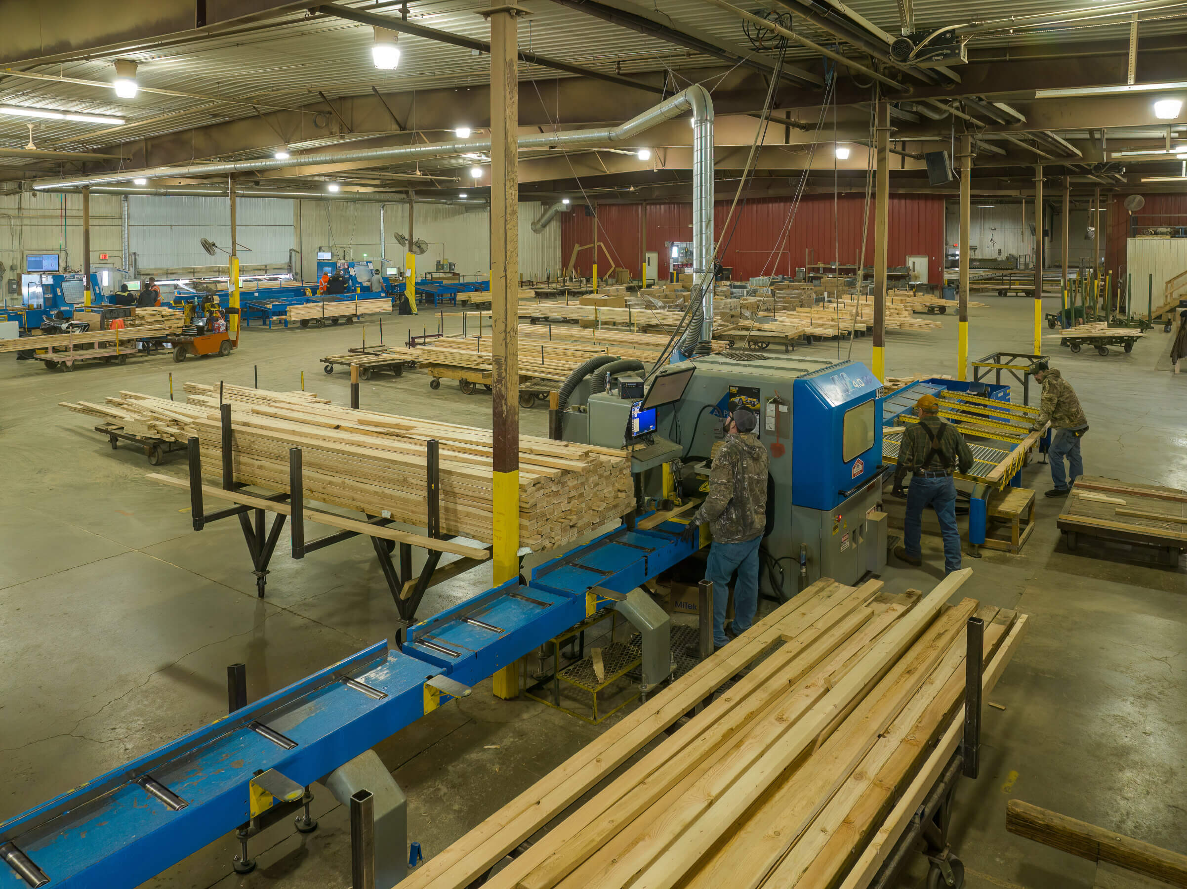 Lumber waiting to be assembled into trusses